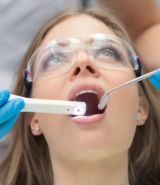 Patient getting her dental exam